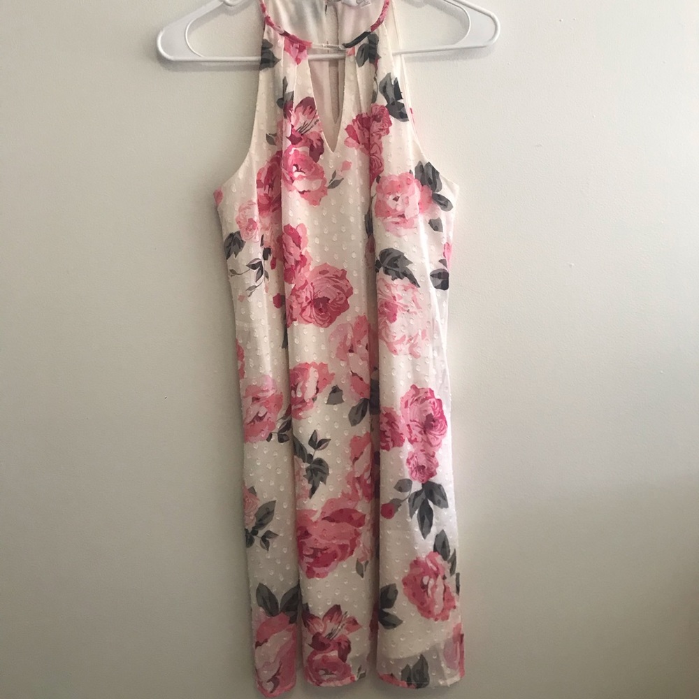 Knee length pink and white floral dress